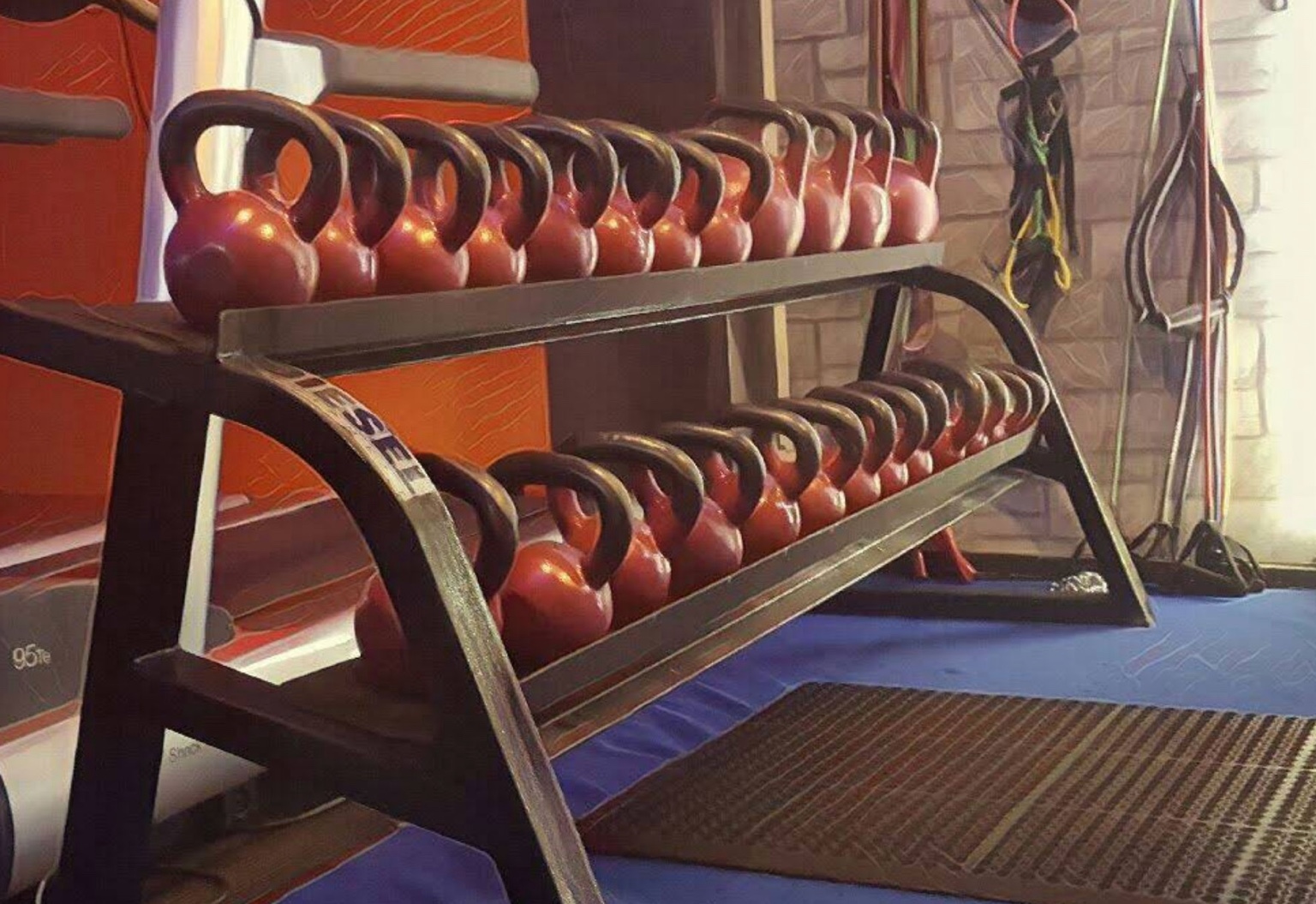 Kettlebells and stretching area at BBK Gym
